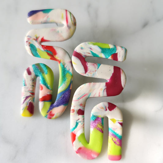 Swirl statement stud