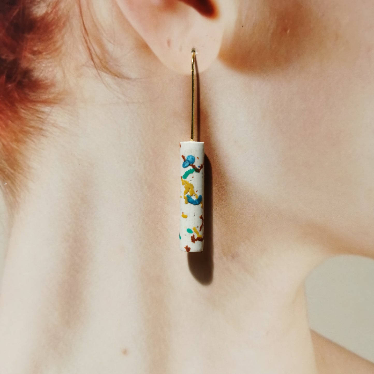 Festival tube dangles