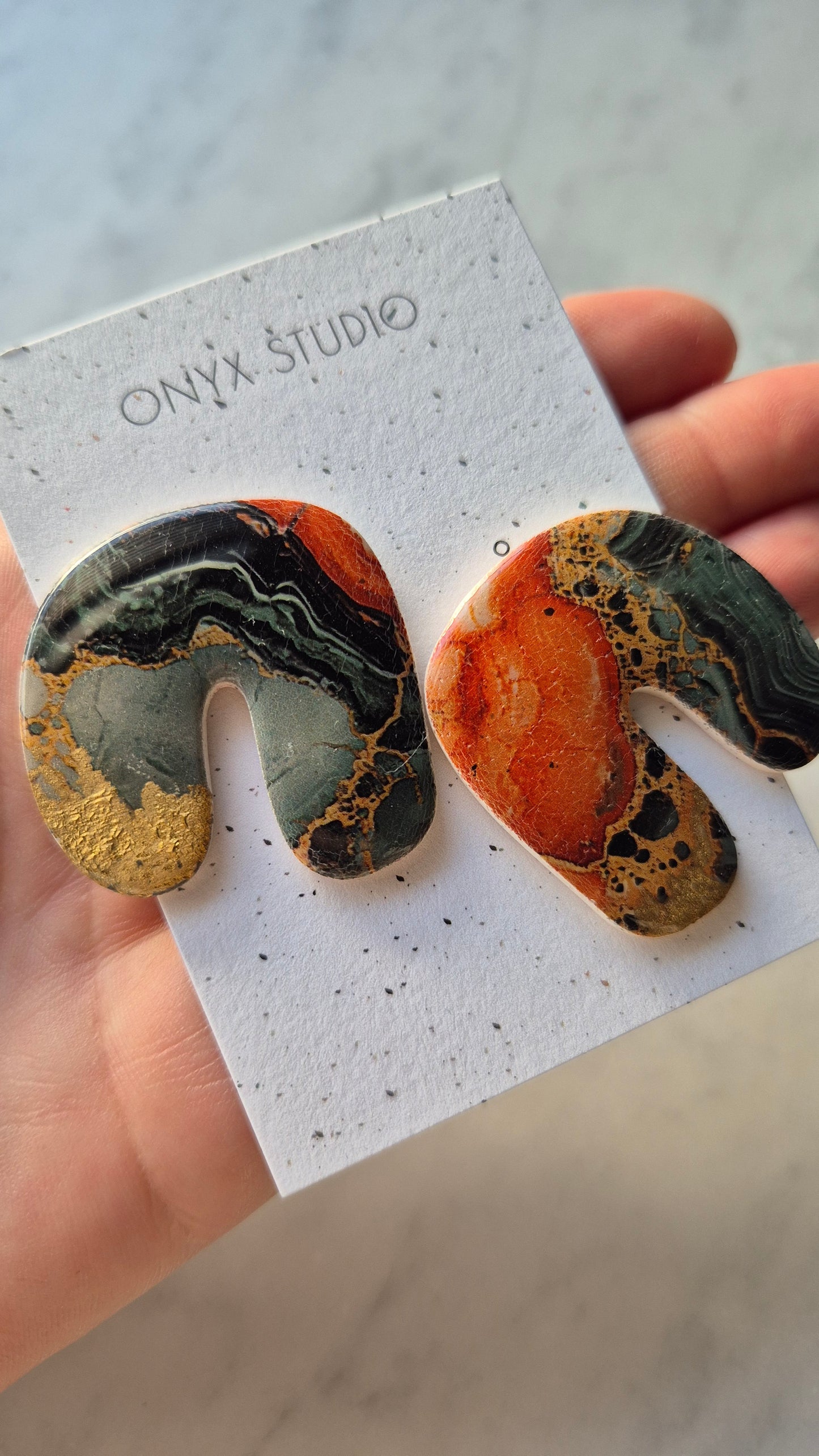 Bold arch statement stud